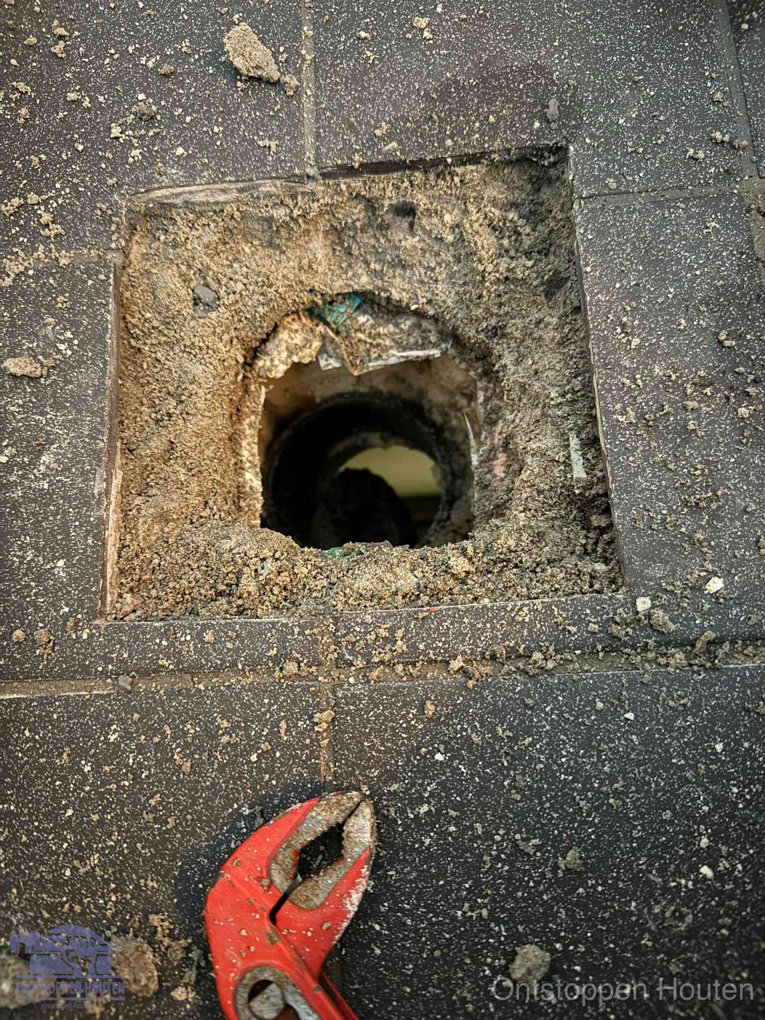 Rioolputje erfgrens eigendom in Houten